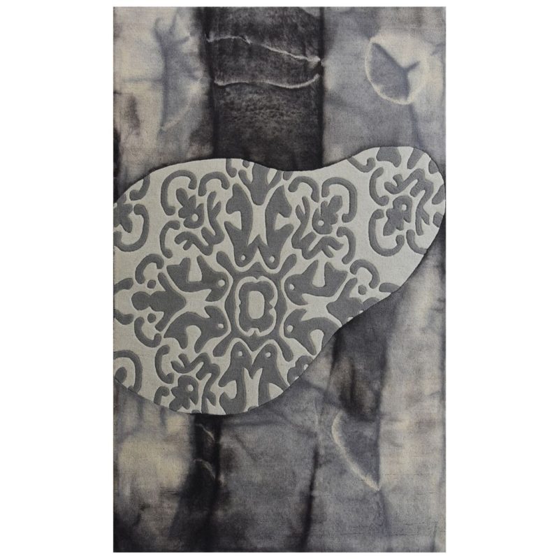 HAND TUFTED